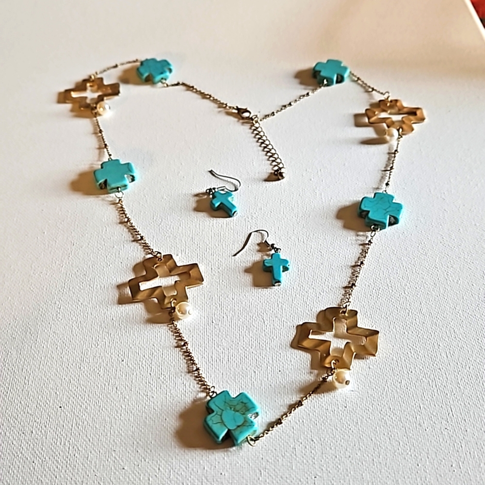 Gold tone cross and bead necklace with earrings